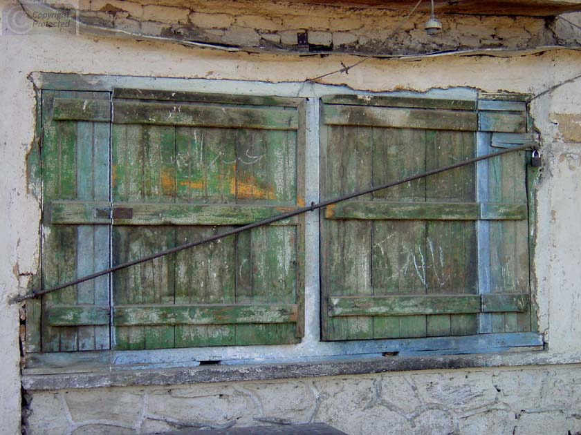 Two Windows with a Bar Across